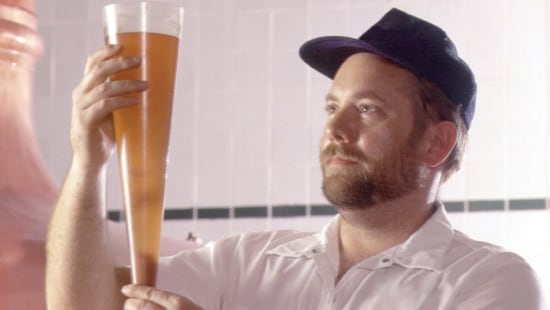 Craft Brewer holding High Quality Beer