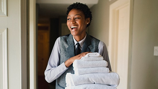 Smiling woman in the hospitality market