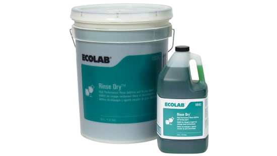 Large commercial tub filled with Ecolab Rinse Dry rinse additive next to a smaller refillable jug.
