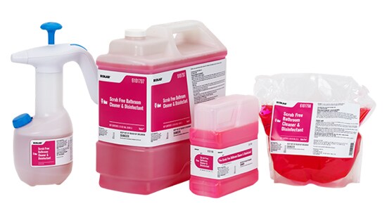 Commercial bottles of scrub free bathroom cleaner beside one hand pump bottle and a refill bag.