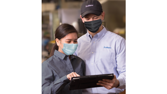 EcoSure specialist in mask coaches customer with tablet
